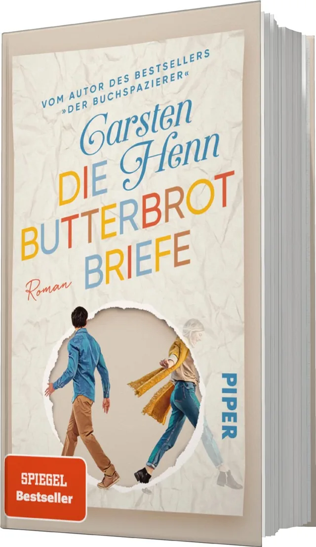 Das Buchcover zeigt einen hellen Hintergrund mit einem ausgestanzten, runden Bereich, in dem zwei Personen dargestellt sind, die sich in entgegengesetzte Richtungen bewegen. Die Figuren sind in lässiger Kleidung gehalten, eine Person trägt eine blaue Jack