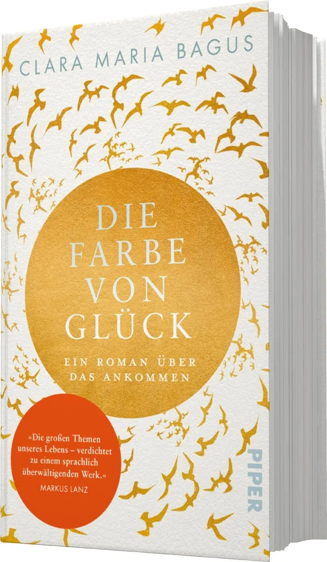 Das Buchcover zeigt einen weißen Hintergrund, auf dem ein großer, goldener Kreis im Mittelpunkt steht. Innerhalb des Kreises ist der Titel „DIE FARBE VON GLÜCK“ in eleganter, serifenloser Schrift in kräftigem Schwarz platziert. Darunter steht der Untertit