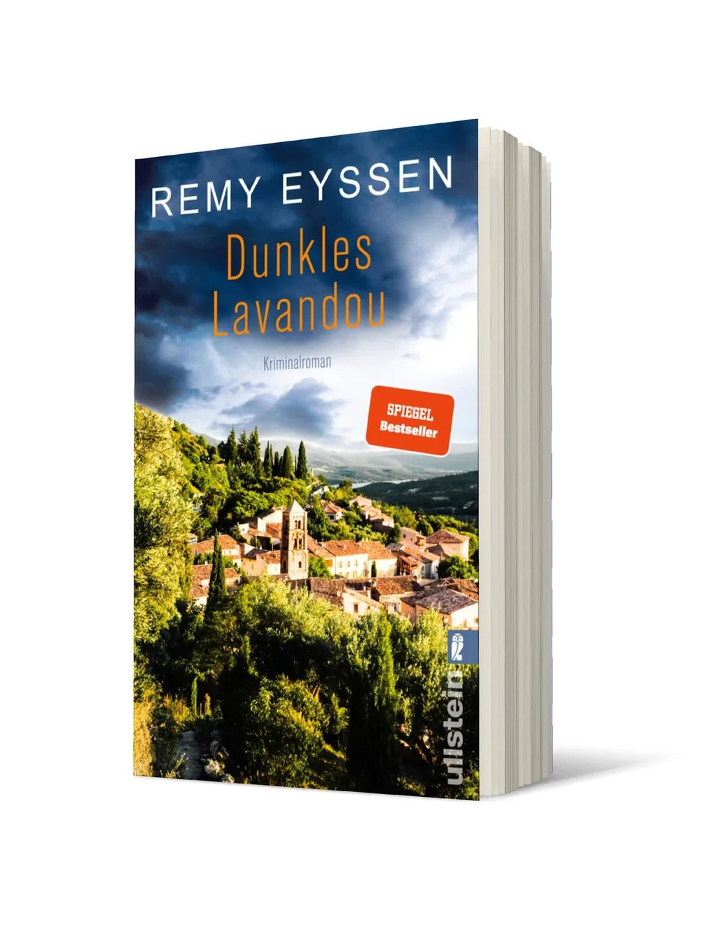 Cover von „Dunkles Lavandou“ von Remy Eyssen: Eine malerische Landschaft mit einer hügeligen Stadt bei bewölktem Himmel, umgeben von Bäumen und Feldern.