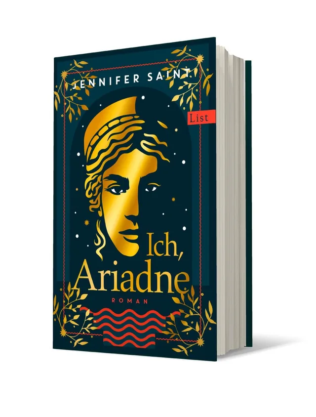 Cover von „Ich, Ariadne“ von Jennifer Saint: Das Cover zeigt ein goldfarbenes Porträt einer Frau mit langen, lockigen Haaren auf dunkelblauem Hintergrund, umgeben von stilisierten Pflanzenmotiven.