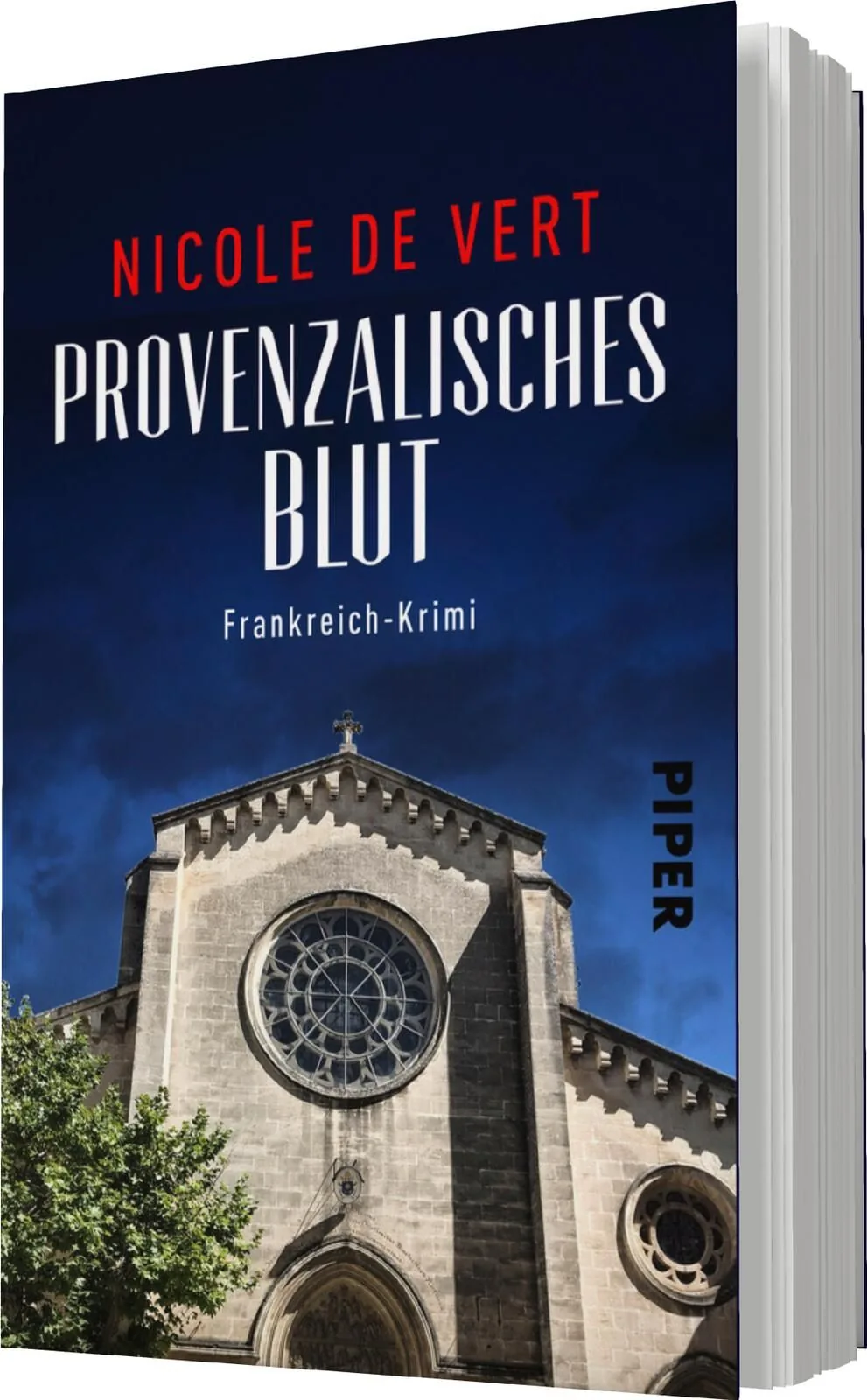 Das Buchcover zeigt eine dramatische Darstellung eines historischen Kirchengebäudes unter einem tiefblauen Himmel. Der Titel „Provenzalisches Blut“ ist in auffälligen, weißen Buchstaben geschrieben und wird von dem Namen der Autorin „Nicole de Vert“ in ro