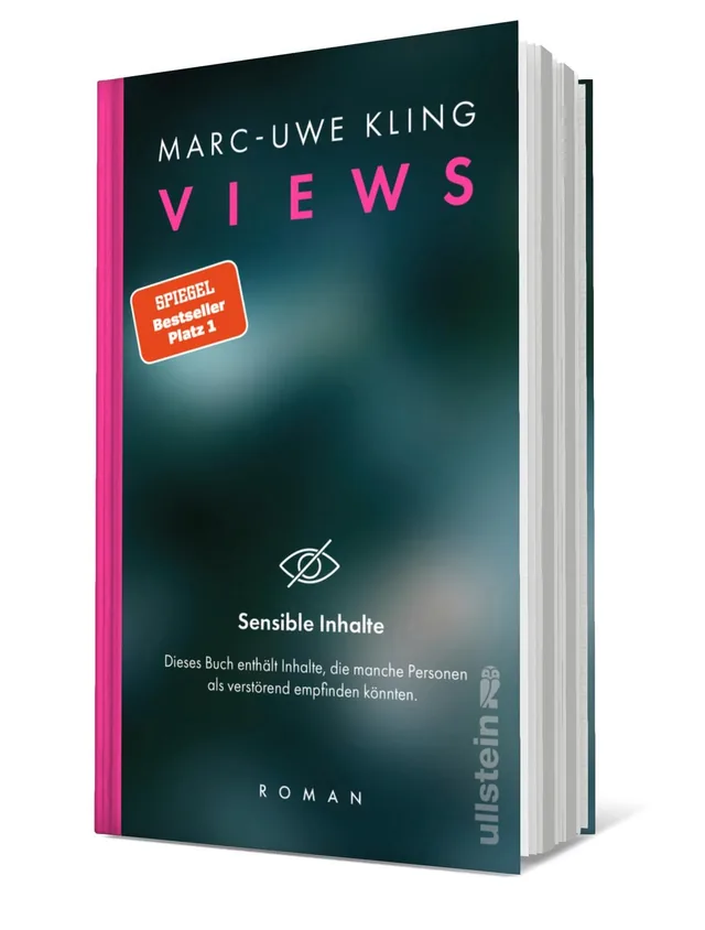 Cover von „VIEWS“ von Marc-Uwe Kling: Das Buchcover zeigt eine unscharfe, dunkle Hintergrundfarbe mit pinken Schriftzügen und einem Hinweis auf sensible Inhalte.